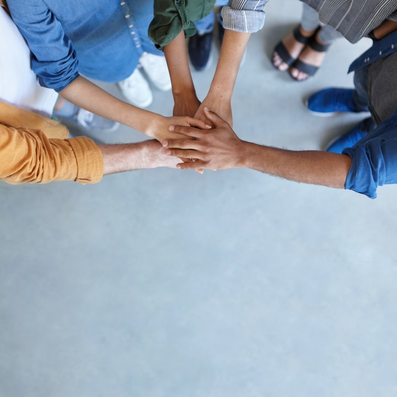 Expert Handicap, Diversité & Inclusion Mains d'une équipe, qui se joignent